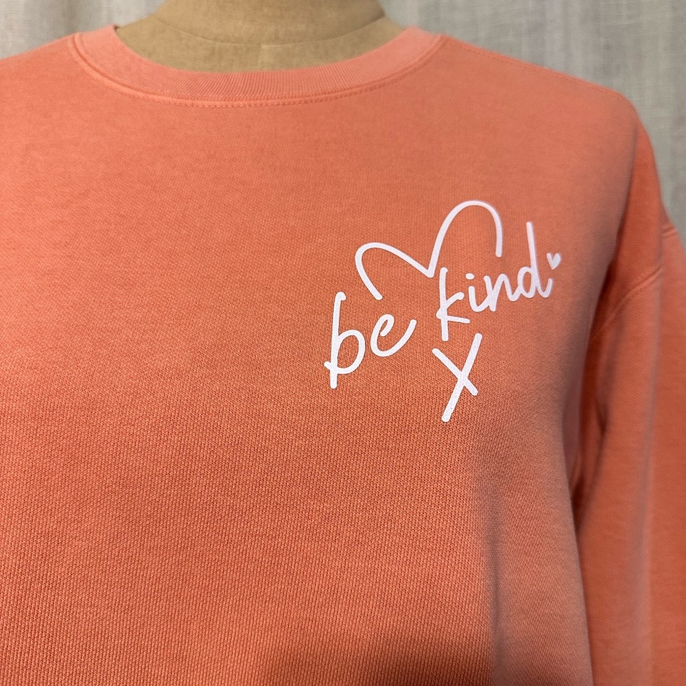 Be Kind Coral Sweatshirt with White Script - pocket print and back full print.